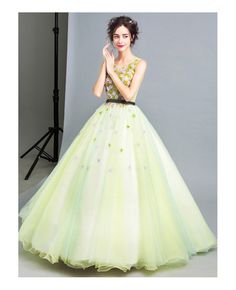 Shop affordable green ball-gown scoop neck floor-length tulle wedding dress with flowers online. Custom-made any size or color. Pro since 2009. Green Ball Gown For Quinceanera, Green Ball Gown For Debutante Ball, Spring Wedding Green Ball Gown, Green Spring Dress For Debutante Ball, Green Dress For Debutante Ball In Spring, Green Tulle Ball Gown For Debutante Ball, Spring Tulle Gown For Quinceanera, Spring Quinceanera Tulle Ball Gown, Spring Quinceanera Tulle Gown