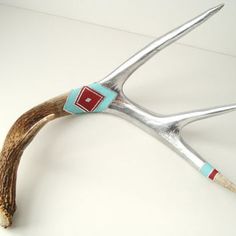 a pair of scissors that have been made to look like antelope's claws