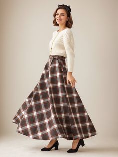 This winter wool skirt is a classic piece of tailoring that will see you through rain or shine. It is cut with a flattering flared skirt to give you a wonderful shape. The winter skirt is perfect classic styling and ends at the ankle. This is a versatile skirt that you'll wear again and again. DETAILS: * 30% wool, 30% fiber, 40% polyester * fully satiny liner * Two side pockets * Right zip closure * has belt loops to keep everything in place  * elastic band at the back to provide some stretch * Plus size full skirt * Ankle length skirt * Perfect for Winter, autumn * Lean More about the items From the FAQs on the page bottom The model is 170 cm (5′ 7″) tall with a 80 cm (31.5") bust, 66 cm (26") waist. She is wearing the plaid wool skirt in size XS. CUSTOM MADE SERVICE If you * Change other Winter Wool Skirt, Custom Skirt, Long Wool Skirt, Wool Plaid Skirt, Plaid Wool Skirt, Ankle Length Skirt, Skirt Maxi, Skirt For Women, Winter Skirt