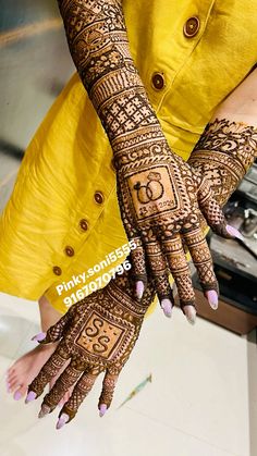 a woman with henna on her hands