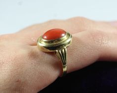 -Vintage 14k Gold Cabochon Natural Deep Red Orange Coral Ring -Ring size: 5.75 US -Coral size: 11.4 mm x 8.65 mm -Total weight: 4.3 g -Marked 585 Red Domed Rings For Anniversary, Red Domed Anniversary Ring, Red Oval Cabochon Ring For Formal Occasions, Formal Red Domed Rings, Red Oval Cabochon Signet Ring For Formal Occasions, Formal Red Oval Cabochon Ring, Formal Red Dome Ring, Red Domed Gemstone Rings, Vintage Red Signet Ring