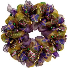 a purple and green wreath with beads