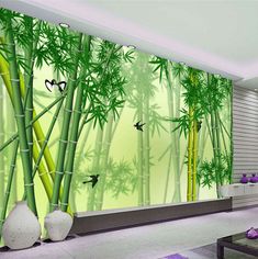 a living room with bamboo trees and birds on the wall