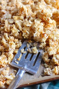 a fork and some food on a tray