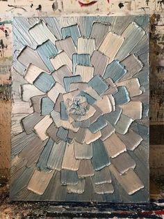 an abstract painting with blue and gray colors