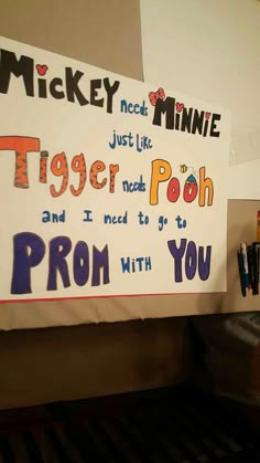 a sign that says mickey and minnie just like tiger pooh and i need to go to prom with you