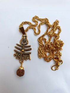 Top Quality/Never Fade/ Divineorigin Brand New Design/Anty-Allegy,1 Pendant is included in this Package,,Height of Pendent is 35 mm (approx.), width is 35 mm (approx.) & Chain Length is 440 mm and Weight is 25 gm.(approx.), Material:Brass & Wood ,Colour:Gold & Brown ,Chain Material:Brass & Wood Wearabiity: Goes well with casual wear, party wear and college wear,Anniversary Gift::Welding Gift::Love Promise Gift::Birthday Gift Special gift on Christmas Gift,Valentine days Friendship Day.Love gifts Temple Necklace With Locket For Diwali Puja, Diwali Temple Necklace With Locket For Puja, Diwali Puja Temple Necklace With Locket, Festive Temple Necklace With Locket For Puja, Locket Necklace For Puja And Diwali, Gold Mala With Tilla For Puja, Diwali Puja Locket Necklace, Gold Mala For Navratri Puja, Gold Mala For Puja And Navratri