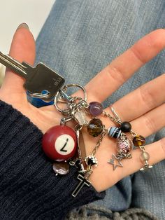 keyring inspo . keychain inspo . 7 ball keyring . maximalist keyring inspo . keyring aesthetic Cute Keyring Aesthetic, The Black Keys Aesthetic, Key Charms Aesthetic, Pants Keychain Ideas, Vintage Keychain Aesthetic, Outfit Inspo Accessories, Key Rings Aesthetic, Diy Car Keychain Ideas, Keychain Charms Aesthetic