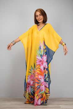 "Beach kaftan, Chiffon dress with big floral print, Sheer Boho summer dress, Long maxi dress perfect as swimsuit cover up  It is a very stylish garment and the long sleeves definitely give it that romantic touch. Smooth as silk Collection--> Produced by NUICHAN & Co PRODUCT SIZE :  * Chest : max 58\" * Waist : max 58\" * Hips : max 58\"  * Length : 55\" from shoulder to hem * Sleeve Length : 17\" from neckline to hem MATERIAL  * Chiffon * Print can be in a slightly different position. MODEL : * Beach Printed Chiffon Maxi Dress, Printed Chiffon Maxi Dress For Beach, Tropical Print Beachwear Maxi Dress For Vacation, Tropical Maxi Dress For The Beach, Tropical Maxi Dress For Beach, Maxi Beach Dress With Tropical Print For Beach Party, Summer Maxi Dress With Tropical Print For Beach, Tropical Print Maxi Beach Dress, Tropical Printed Dresses For Beach Season