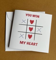 a card that says, you won my heart with two crosses and hearts on it