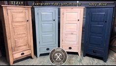 three different colored wooden doors in a store