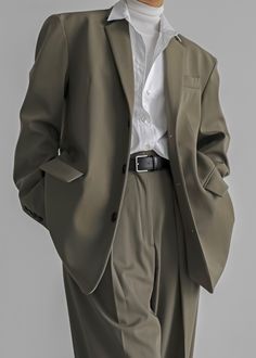 Color: Olive Midweight traditional suiting fabric Oversized silhouette Padded shoulders Flap front pockets Button front closure Lined 72% Polyester 22% Rayon 4% Wool 2% Spandex Dry Clean By The Frankie Shop. Imported One Size Formal Wear Men, Formal Blazer, Single Button Blazer, Tomboy Fashion, Oversized Blazer, Suit Fashion, Casual Style Outfits, Model Height, Classy Outfits