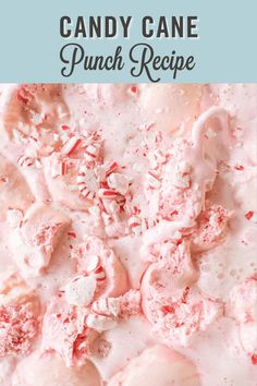 a white plate topped with candy cane punch recipe and text overlay that reads, candy cane punch recipe