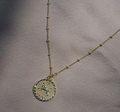 Our Zodiac Coins are meaningful reminders of the unique qualities possessed by each of the astrological signs. These eye-catching necklaces are a perfect way to personalize a gift for yourself or a loved one! The perfect every day necklace. Astrology Zodiac, Coin Pendant