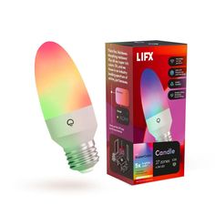 a colorful light bulb next to a box