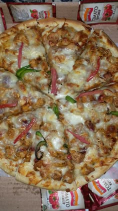 a pizza sitting on top of a cardboard box