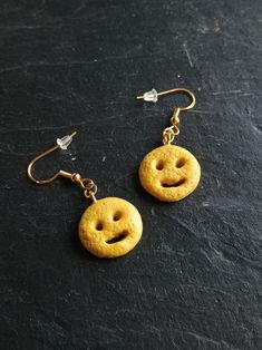 Looking for a fun piece of jewelry to show off your whimsical side? Are you searching for a unique gift? Why not mix it up a little with this one-of-a-kind pair of handmade earrings? These polymer clay smiley fry earrings will leave your mouth watering! They're sure to make you stand out in a crowd or make a fun gift! Each earring is attached to a hypoallergenic silver-colored stud and comes with a butterfly earring back.  Because I make my earrings by hand, each one has a slightly different app Playful Jewelry With Matching Earrings For Party, Novelty Gold Jewelry Gift, Cute Single Dangle Earring, Whimsical Everyday Drop Earrings Jewelry, Everyday Whimsical Drop Earrings, Whimsical Everyday Drop Earrings, Adjustable Novelty Single Earring Jewelry, Playful Adjustable Dangle Jewelry, Playful Everyday Dangle Jewelry