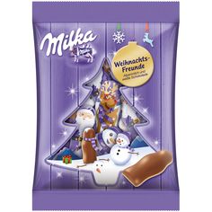 milk chocolate christmas tree with marshmallows and snowmen on the bottom, in front of a purple background