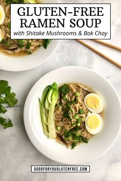 two white bowls filled with ramen soup and topped with hard boiled eggs