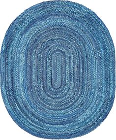 a blue rug with an oval shape in the center on a white background, it is made