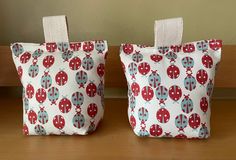 two little bags with ladybugs on them