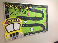 a bulletin board that says road to success