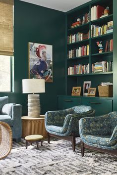 a living room filled with furniture and bookshelves