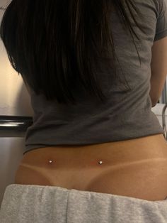 Low Back Piercing, Back Dermal Jewelry, Back Pirsings, Gold Dermal Piercing, Hip Dermals Aesthetic, Back Dimple Piercing Aesthetic, Dermal Piercing With Tattoo, Sims 4 Back Dermal Piercing, Hip Piercings Dermal