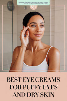 A woman in a bathroom applies the best eye cream to her under-eye area, promoting skincare for puffy eyes and dry skin.