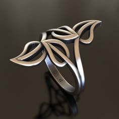 Discover the beauty of nature with our Leaves Silver Ring, meticulously crafted from 925 sterling silver. This elegant ring features a stunning leaf design, perfect for those who appreciate the natural world. The adjustable band ensures a comfortable and secure fit, making it a versatile addition to any jewelry collection. Ideal for everyday wear or special occasions, this ring adds a touch of sophistication and elegance to any outfit. Whether you're treating yourself or looking for a unique gif Nature-inspired Rings With Polished Finish, Nature-inspired Sterling Silver Jewelry With Polished Finish, Nature-inspired Sterling Silver Rings With Polished Finish, Nature-inspired Silver Flower Ring, Nature-inspired Sterling Silver Ring With Oxidized Finish, Silver Sterling Flower Ring Nature-inspired, Silver Clay, Viking Ring, Masonic Ring