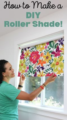 a woman is working on the roller shade in her living room with text overlay that reads how to make a diy roller shade