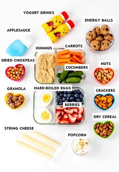 the contents of a healthy lunch including carrots, celery, blueberries, and peanuts