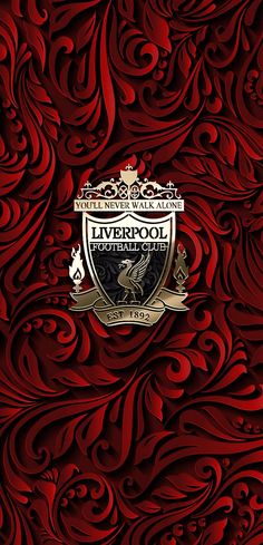 the liverpool football club logo on a red background with swirls and curls in it