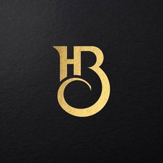 the letter b is made up of gold foil and has a circular shape on it