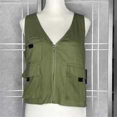 Indigo Raising Sz M Army Green Utility Style Vest W/ Pockets New Colors May Vary From Monitor To Monitor Or From Phone To Phone. Casual Green Work Vest, Spring Utility Cotton Vest, Utility Tops For Spring Workwear, Spring Utility Style Tops For Workwear, Trendy Spring Vest With Zipper Closure, Spring Utility Fitted Vest, Fitted Utility Vest For Spring, Fitted Utility Tops For Summer, Casual Spring Vest With Zipper Closure