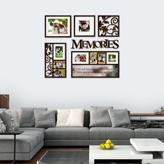 a living room filled with furniture and pictures on the wall above it's coffee table