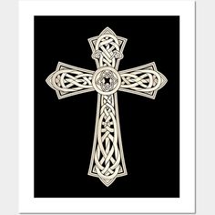 a cross with an intricate design on the front and back, against a black background