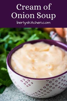 an onion soup in a bowl with parsley on the side and text overlay that reads cream of onion soup