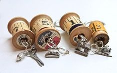 several wine corks with some charms attached to them