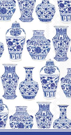 many blue and white vases on a white background