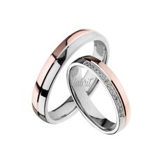 two white and rose gold wedding rings with diamonds on the inside, set against a white background