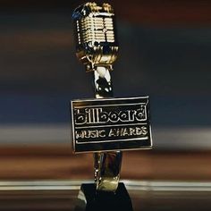 a microphone with a sign that says billboard music awards