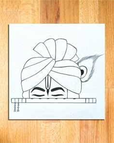 a drawing of a person with a turban on their head