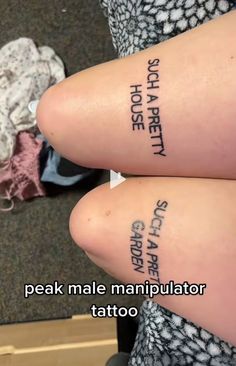 two people with tattoos on their legs that read, speak male manipulator tattoo