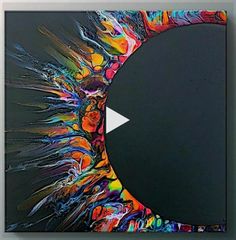 an abstract painting with black circle and white arrow on it's center piece, surrounded by multicolored lines