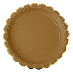 a brown paper plate with scalloped edges