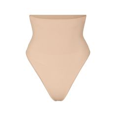 Get ultimate compression with our highest support level in this high-rise shapewear thong that sculpts, smooths, and tones your core and tummy. Wear this silky staple under everything to enhance your natural shape. Features removable adjustable straps. | SKIMS High-Waisted Thong | Light Neutral | Core Control Stomach Shapewear, Best Shapewear For Dresses, Shapewear Thong, Shapewear For Wedding Dress, Thong Shapewear, Dr Script, Bridal Shapewear, Austin Apartment, Girdles Shapewear