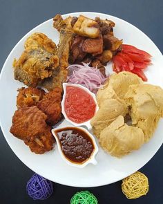 a white plate topped with different types of food