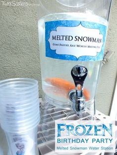 a frozen birthday party with water station and cups