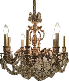 an antique chandelier with five lights on it